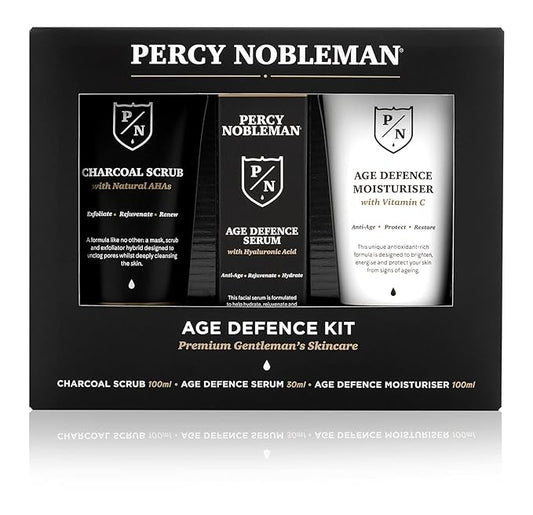 Percy Nobleman Age Defence Kit, a men's skincare set containing Charcoal Face Scrub (with Natural AHAs), ultra-hydrating Facial Serum (with Hyaluronic Acid), and Moisturiser (with Vitamin C)