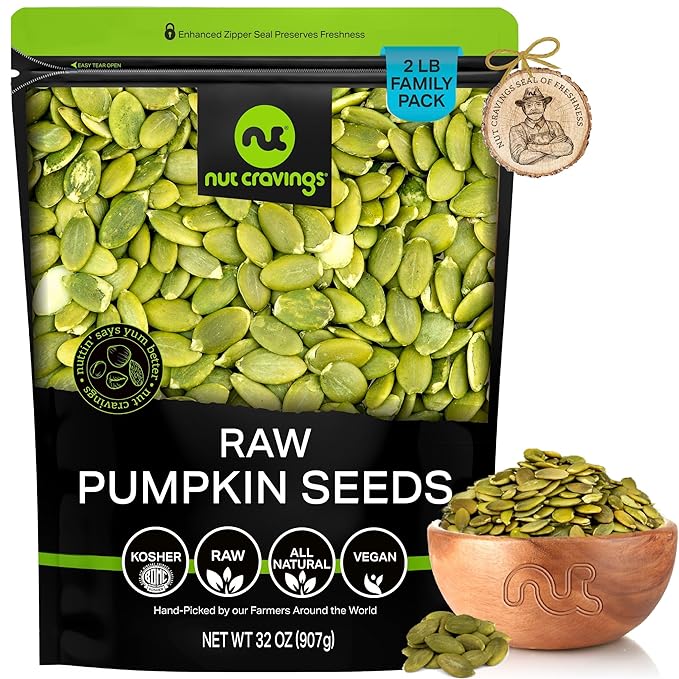 NUT CRAVINGS - Raw Pumpkin Seeds Pepitas, Unsalted, Shelled, (32oz - 2 LB) Bulk Nuts Packed Fresh in Resealable Bag - Kosher Healthy Snack, Food Assortments Ideal for Trail Mixed Nuts